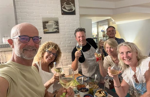 Make pasta, drink wine. Cooking class with transported included!