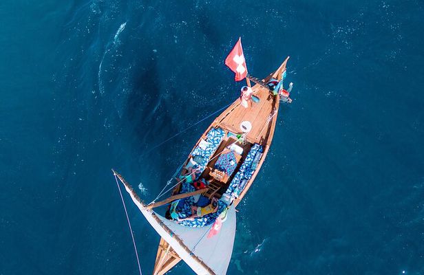 Full-day Dhow Sailing trip to Mnemba sandbank with snorkeling