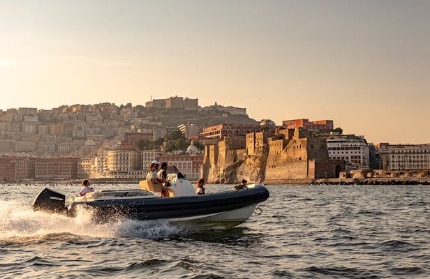 Aperitif on a boat at sunset in the Gulf of Naples