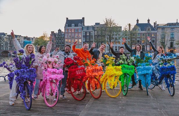 Explore Amsterdam canals on iconic Flower Bikes
