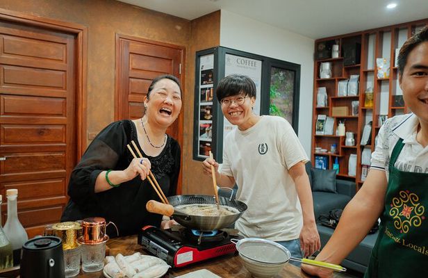Experience Hanoi Cooking Class with Free Wine Tasting