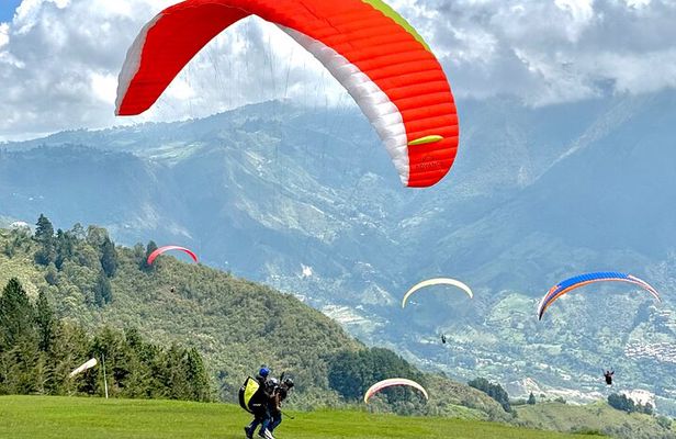 Paragliding Over Medellín + Gopro & Photos + Private transport.