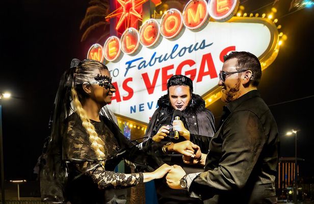 Goth Wedding or Vow Renewal at Vegas Sign with Props and Photos