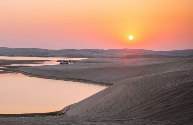 Sunset & sunrise Desert Safari with Sandboarding and Camel Ride