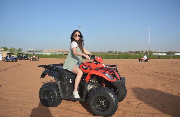 4 Hours Desert Tour with Quad Bike Camel Ride & Sandboard