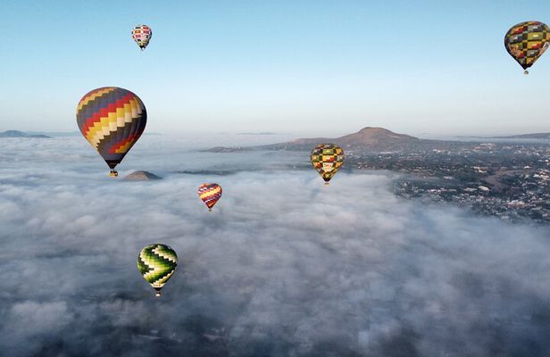 Hot Air Balloon Flight with Breakfast in Cave and Transportation
