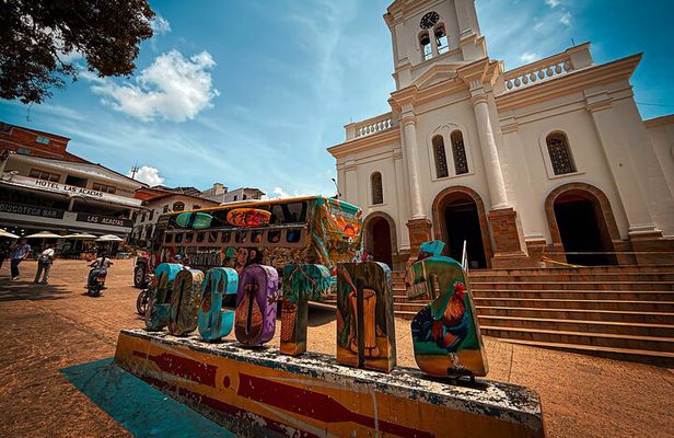 Medellin Tour to Cocorna Slide Extreme Paragliding and Rafting