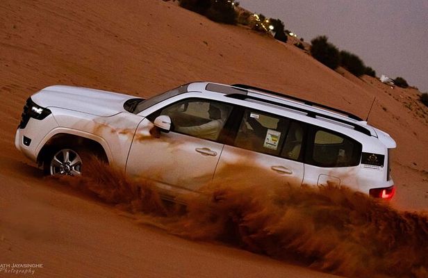 Evening Desert Safari Dubai with Quad Bike Camel Ride and BBQ