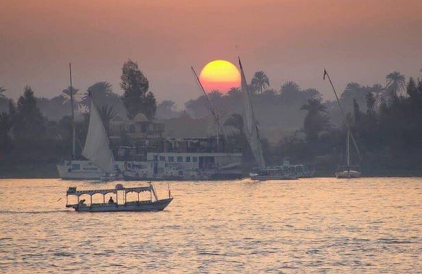 Felucca Sailboat ride on the Nile at Sunset with Tea time 