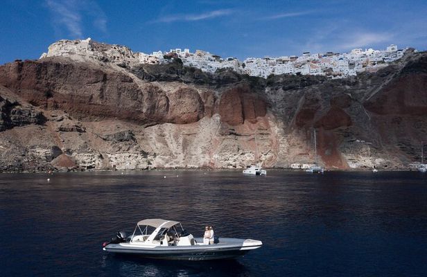 Island hopping (Santorini & Ios)on a private motorboat