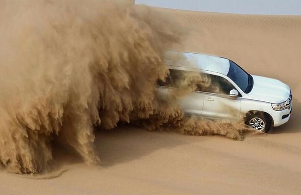 Doha: Inland Sea Desert Safari with Camel Ride & Dune Bashing