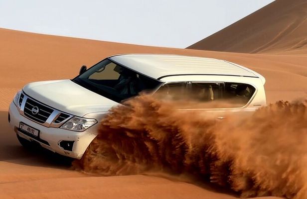 Lahbab Sunset Safari – Camel Ride, Dune Bashing, BBQ & Live Shows