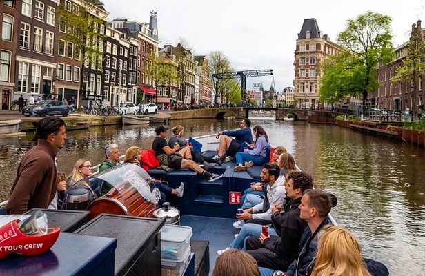 Amsterdam Open Boat Cruise with Live Guide and Two Drinks