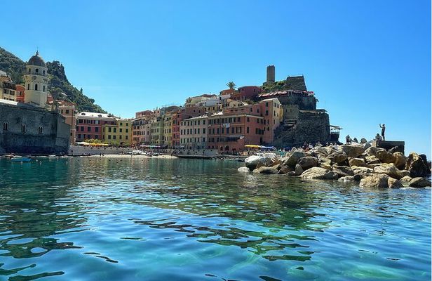 Private tour to Cinque Terre on a traditional Ligurian gozzo boat.