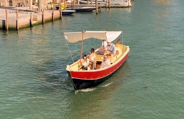 Sunset in a typical boat in Venice