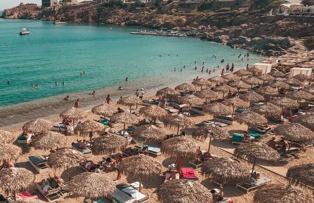 Mykonos Combo: Guided Walk, Reserved Sunbeds & Transport