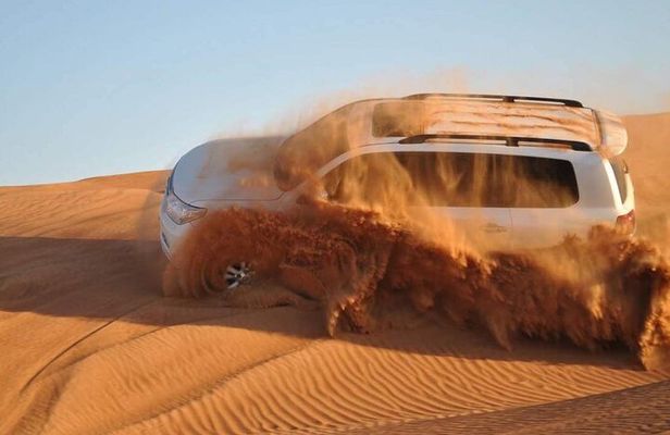 Dubai Desert Safari Dune Bashing, Camel Ride, and BBQ Dinner
