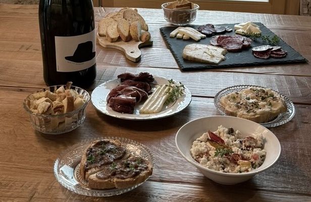 Wines and cold cuts and cheeses in the cellar