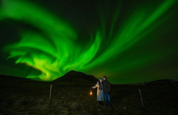 Northern Lights Tour with Photos, Snacks, Warm Snowsuits & Chairs