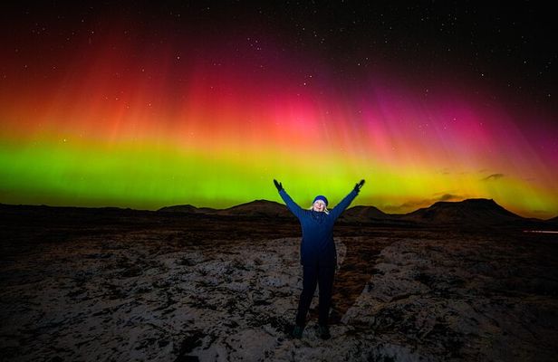 Northern Lights Small-Group Tour with Photos, Snacks & Snowsuits