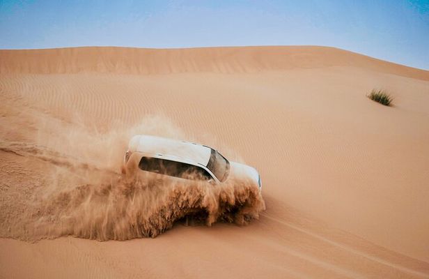Evening Desert Safari Abu Dhabi with Dune Bashing & BBQ Dinner