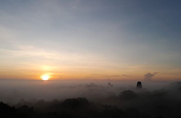 From Flowers Sunrise in Tikal and Sunset in Yaxha in a day