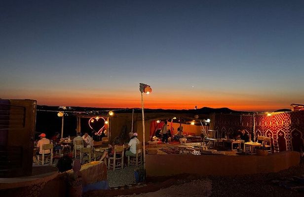 Agafay Desert Sunset Camel Ride, Dinner & Fire Show