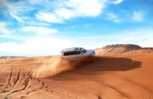 Qatar Shared Desert Safari with Sandboarding and Camel Ride