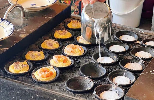 Nha Trang Local Food Tasting and Sightseeing Tour By Scooter