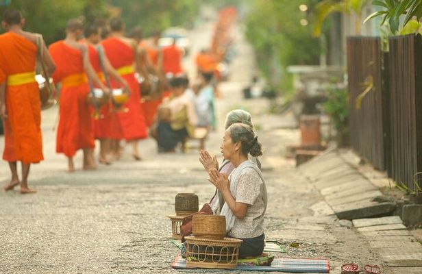 Luang Prabang Alms Giving and Kuang Si Waterfall Private Tour