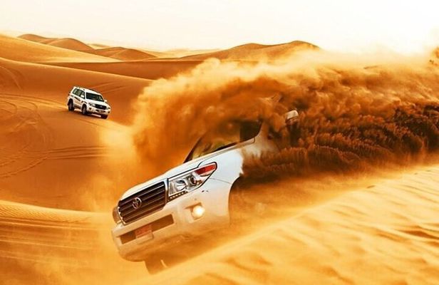 Abu Dhabi Desert Safari 4x4 Dune Bashing ATV Quad Show and Dinner