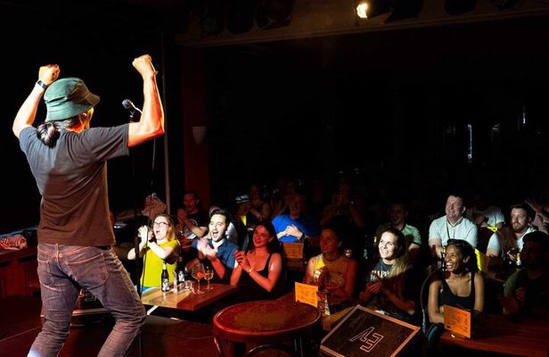 English Comedy Show with Pizza and Shots in Central Berlin
