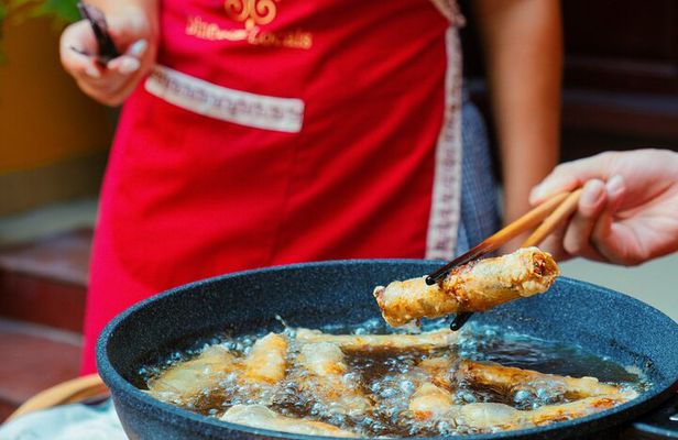 Experience Hanoi Cooking Class with Free Wine Tasting