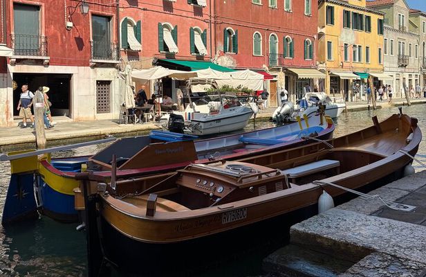 Explore Murano Burano and Torcello in semi-private bragozzo