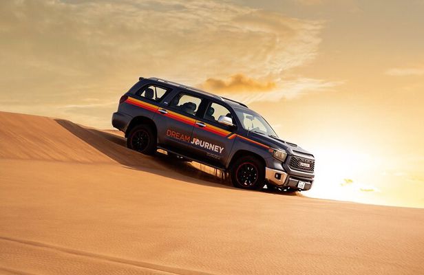 Dubai Desert Safari - Camel Ride, Sandboarding & Quad Bike