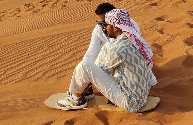 Dubai Layover Desert Escape: Red Dunes Safari, Camel Ride, & BBQ