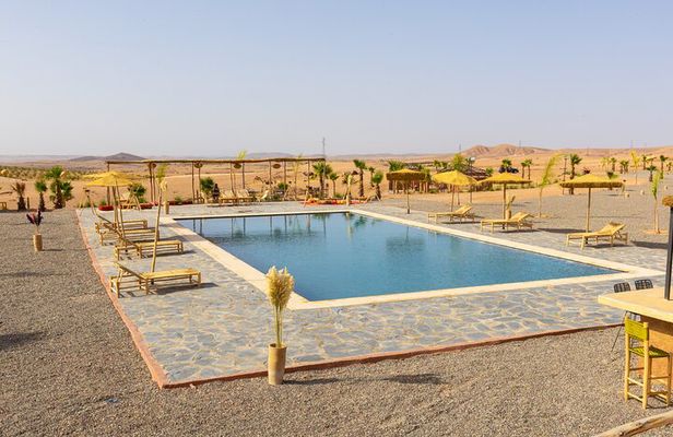 Agafay Desert Night Pass Dinner Show and Camel Ride Experience