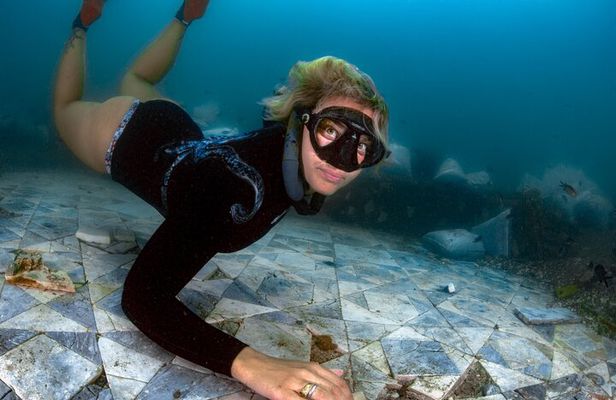 Snorkeling in the Sunken Pompeii Double Dive