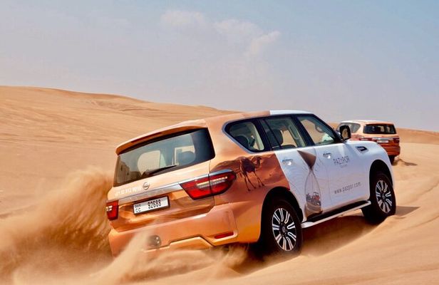Dubai Red Dunes Safari with Dune Bashing, Camel Ride, BBQ Dinner