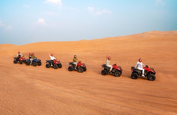 Dubai Desert Safari with Quad Bike Ride & BBQ Dinner & Live Shows