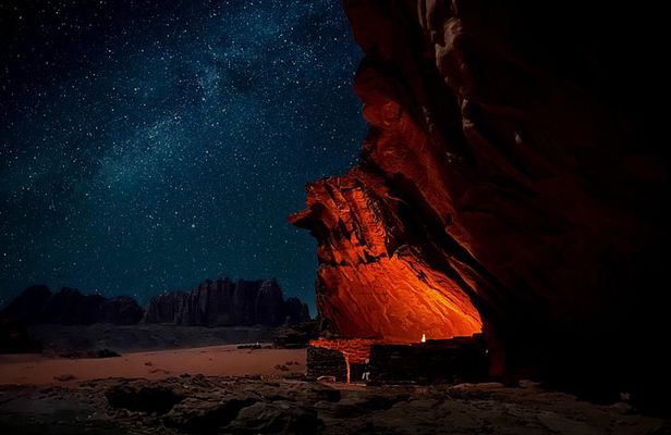 Wadi Rum Cave Camping with Afternoon/Sunset Camel Ride