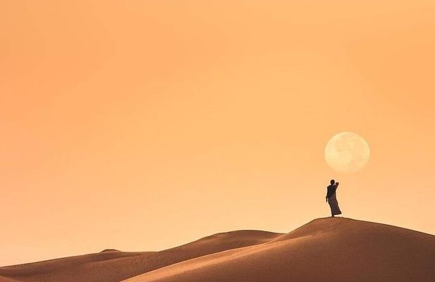 Doha Sunrise Desert Safari with Camel Ride & Sandboarding