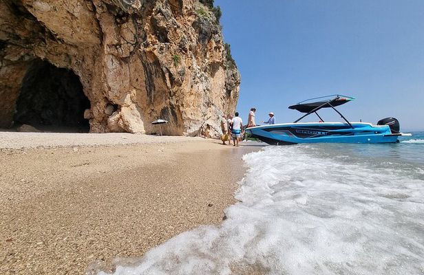 Dhermi: Boat tour of the caves with swimming stops