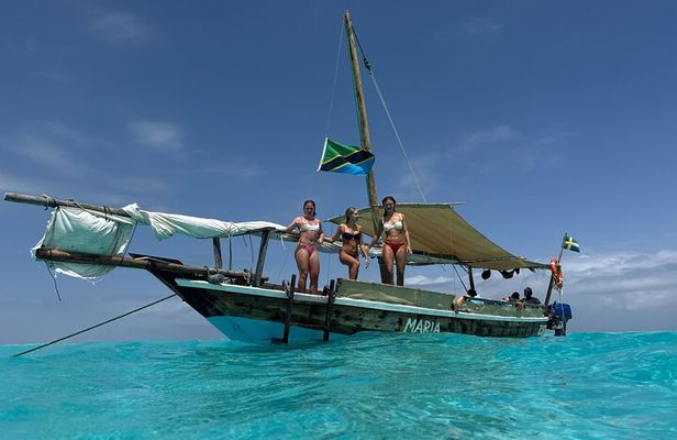 Mnemba Island Dhow Snorkeling and Seafood Lunch Experience