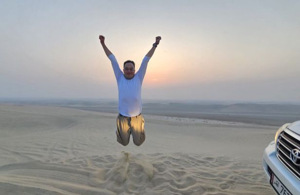 Doha airport layover transfer private desert safari camel ride