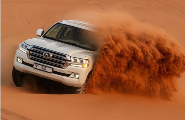 Dubai Red Dune Desert Safari with Camel Ride, Dune Bashing & BBQ