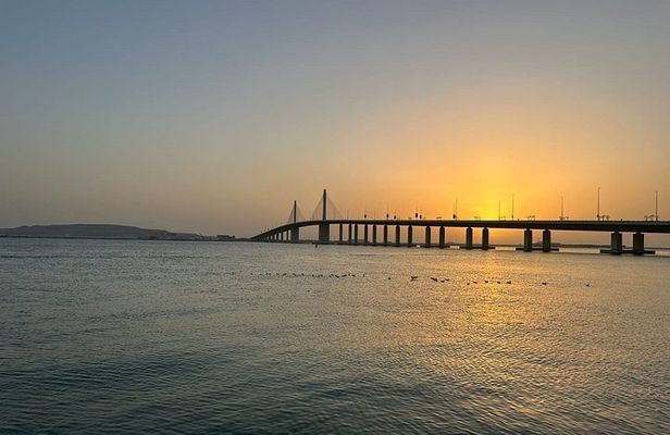 Sunset Cruise with Etihad Tower Views and Beach Walk