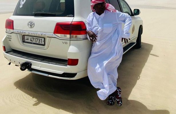 Qatar Desert Adventure Dune Bashing Camel Ride and Falcon photo