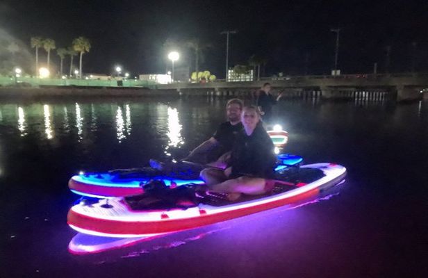 Nighttime iSUP Glow Paddleboard Adventure in Daytona Beach