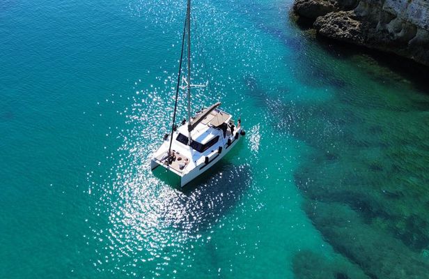 Catamaran tour stops bathing and snorkeling toast with prosecco